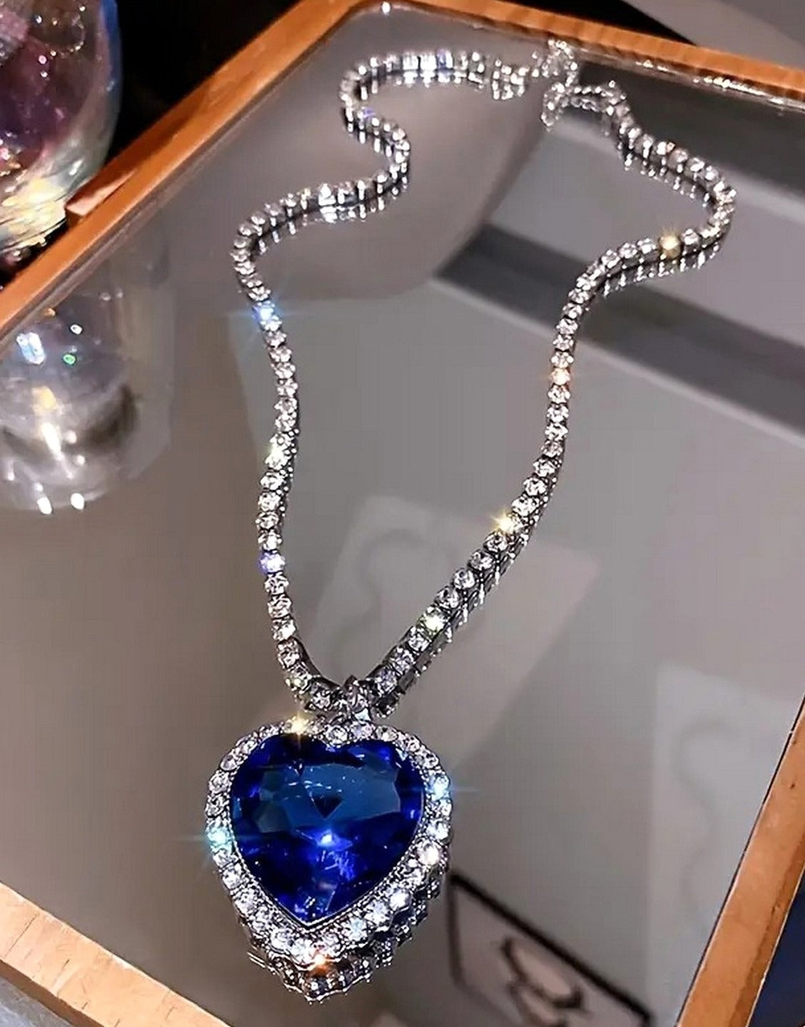 Luxurious Titanic Heart of the Ocean Inspired Blue Stone Pendant Necklace for Women (TK18113)