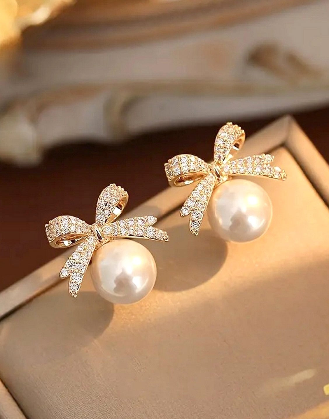 Dazzling Rhinestones Bow Shape Faux Pearls Stud Earrings (TK18131)