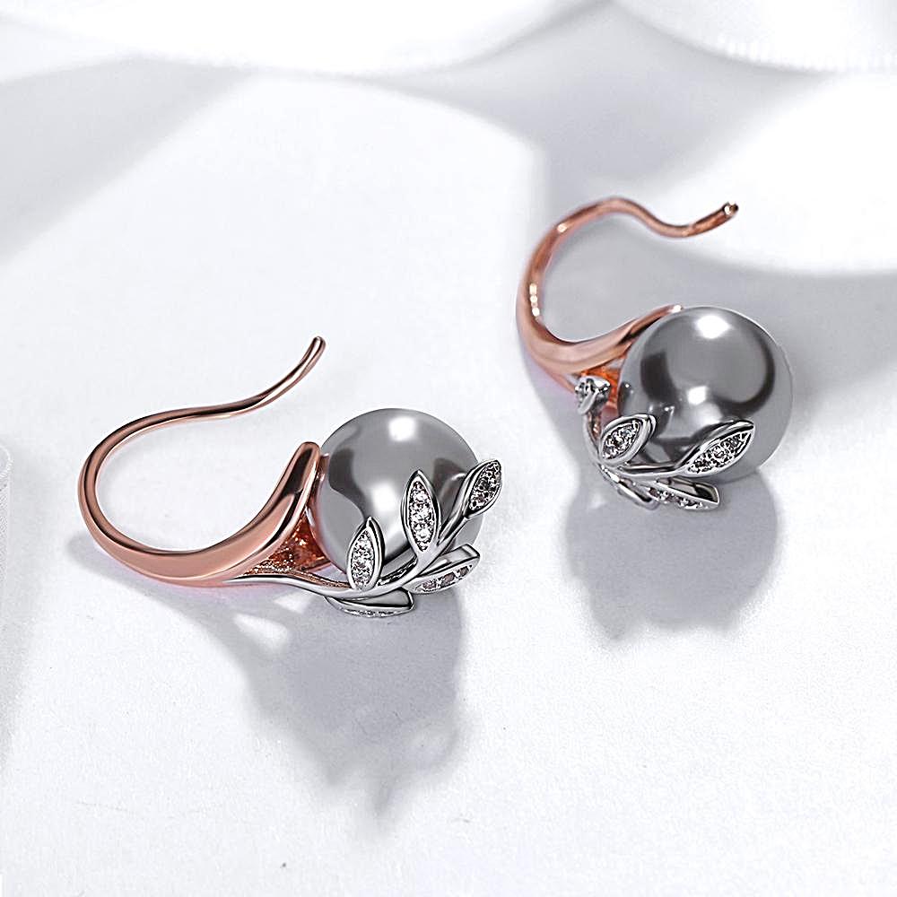 Dangling Pearl Earrings Rose Gold - trinkets.pk