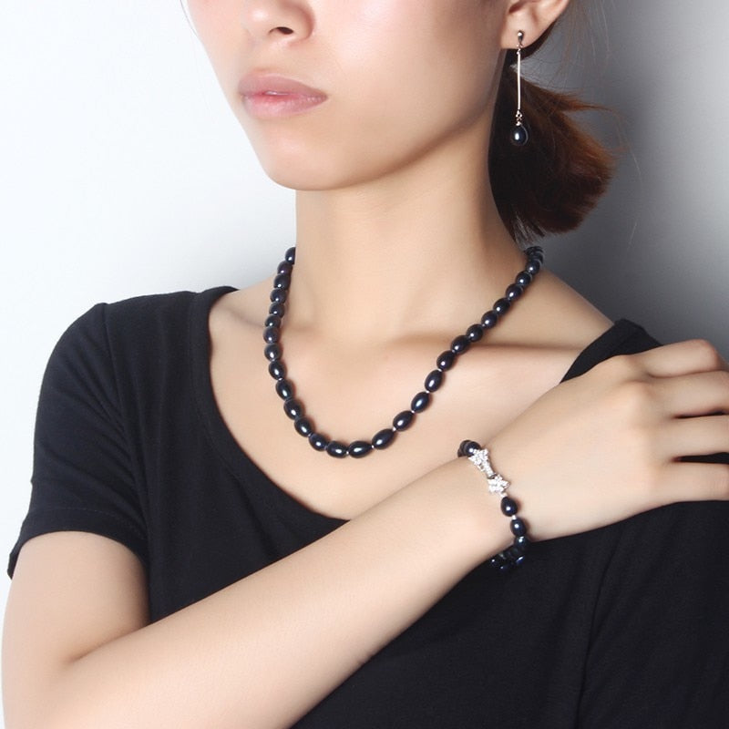 Dangling Black Freshwater Pearl Earrings - trinkets.pk