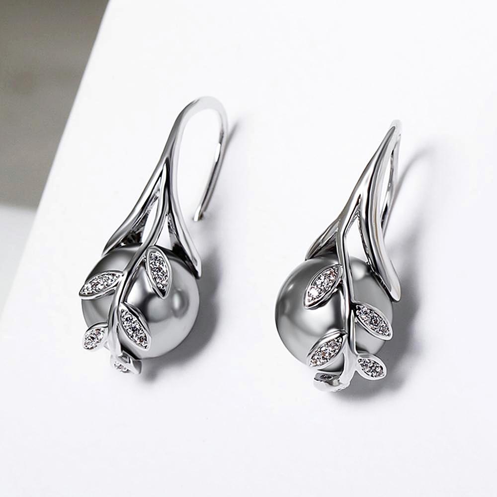 Dangling Pearl Earrings Rhodium Plated - trinkets.pk